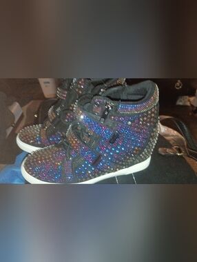 These high-top wedge sneakers, heavily embellished with multi-colored rhinestone
